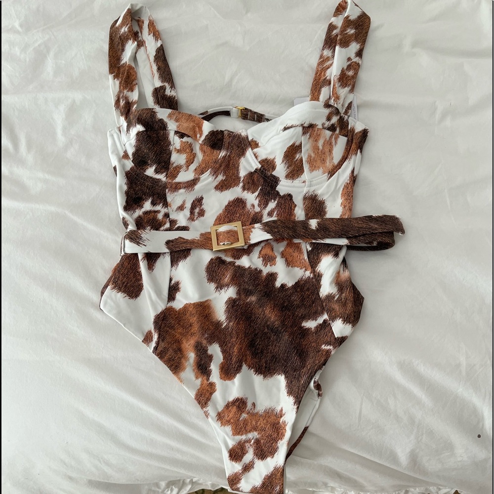 Brand new with tags WEWOREWHAT cow print one piece